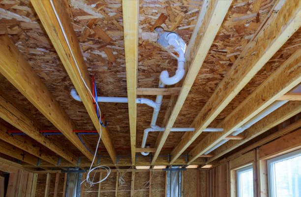 Waste PVC pipe drainage system inside building, piping on the ceiling of home
