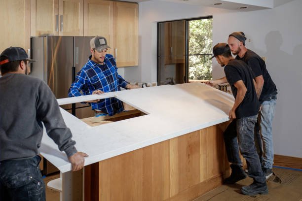 Kitchen remodel - men installing countertops