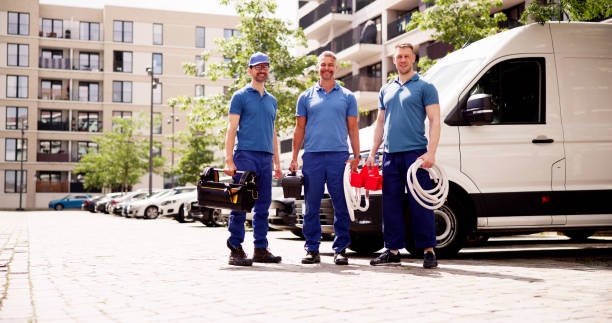 Two NorTech certified technicians standing by their service van